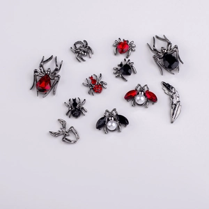 Gothic insect nail art charms in gun black alloy with red stones and pearls