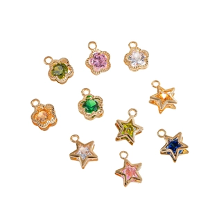 10-piece set of gold-plated flower and star charms with colorful cubic zirconia stones