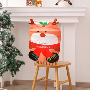 Christmas reindeer chair cover in red and orange for festive dining room decor