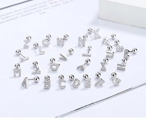 Detailed close-up of S925 sterling silver screw-back alphabet earrings with cubic zirconia