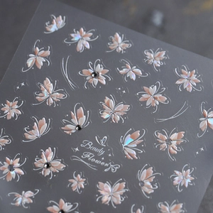 Self-adhesive nail art sticker featuring pink holographic flower and butterfly designs