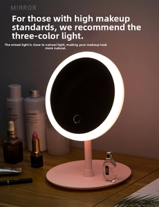 Detail of pink LED makeup mirror with storage base and three-tone adjustable light mode