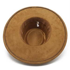 Detail view of the brown fedora interior with adjustable sweatband and 100% polyester label