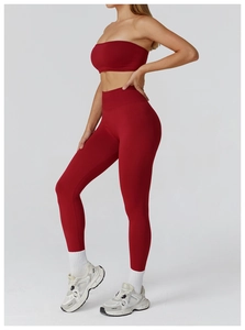 Side view of seamless dark red yoga set featuring high waist leggings and sports bra