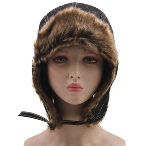 Winter faux leather trapper hat with warm earflaps and brown faux fur lining
