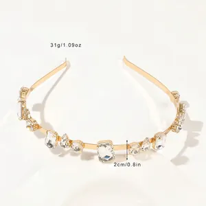 Detailed view of golden leaf headband showing 31g weight and 2cm width dimensions