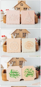 Detailansicht von Weihnachts-Kekstempeln mit Merry Christmas Motiven für festliches Gebäck