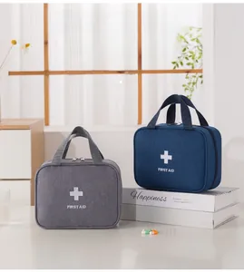 Close-up of portable first aid kit bag with sturdy handle and medical cross symbol