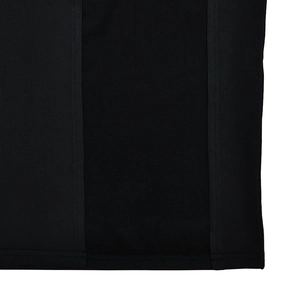 Macro detail of black fabric texture and neat stitching on a backless slit maxi dress