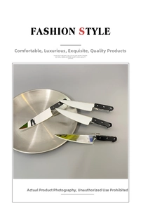 Detail showing creative kitchen knife shaped hair clips with metallic finish on a round plate