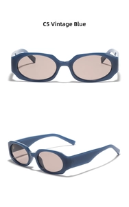 Close-up of retro blue narrow frame sunglasses with light purple tinted lenses