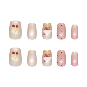 Handmade cherry ice cream style press-on nails with red dots and pearl cat-eye finish