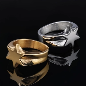 Vintage stainless steel star rings in gold and silver finish with reflection