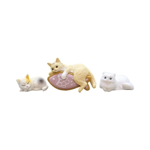 Detailed view of three cute resin cat figurines including orange and white sleeping poses