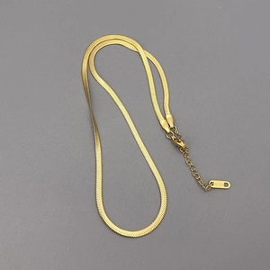 Close-up of 18KGP gold plated snake chain necklace with lobster clasp and extender