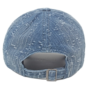 Detail of adjustable metal buckle and jacquard pattern on blue denim baseball cap