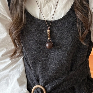 Retro geometric necklace with dark brown wood resin bead pendant and metallic tube accent