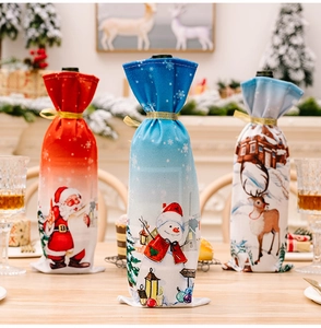 Detail of Christmas wine bottle covers featuring Santa, Snowman and Reindeer prints