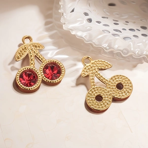 Pendentif cerise doré avec pierres rouges pour la création de colliers et boucles