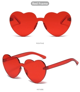 Detailed front and 45-degree side views of red rimless heart-shaped fashion sunglasses