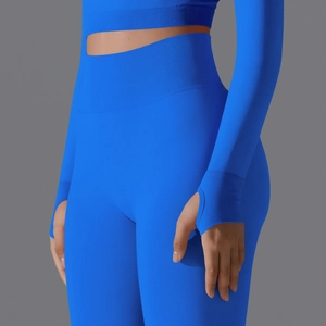 Close-up of bright blue seamless yoga set with high waist and ribbed waistband detail