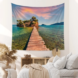Tapisserie de coucher de soleil sur la mer avec un ponton menant à une île panoramique