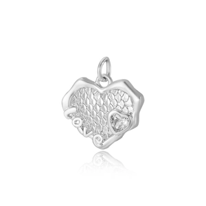 Macro shot of silver heart pendant with textured finish, LOVE lettering and zircon crystal