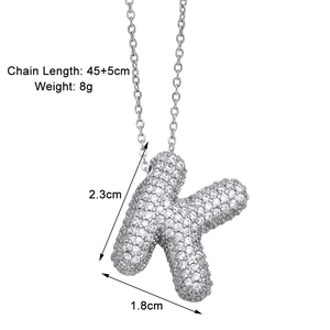 Detailed view showing dimensions and weight of silver pave-set letter K pendant necklace