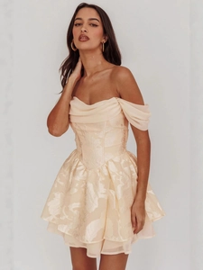 Off-shoulder peach jacquard mini dress with ruffle neckline and slim fit floral texture