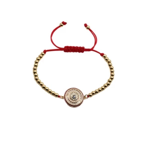 Adjustable red string bracelet with gold beads and micro-set zircon evil eye pendant