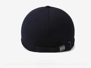 Detail of dark blue baseball cap back with metal adjustable buckle and ribbed hem