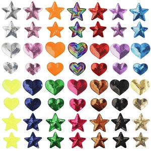 Array of colorful sequin heart and star patches in various sizes on a white background