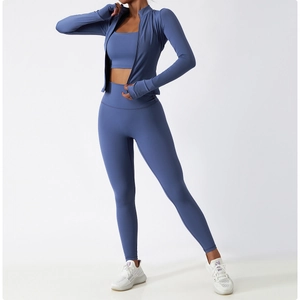 Detail of high waist yoga leggings and jacket with thumbholes in misty blue fabric
