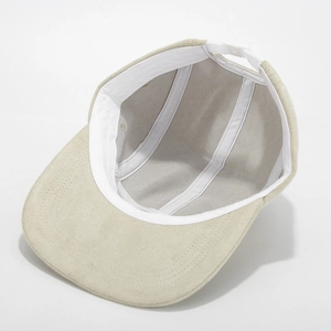 Beige solid faux suede wide brim baseball cap with adjustable strap and inner seams