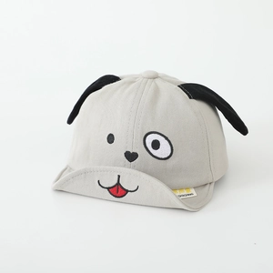 Close-up of soft grey cotton baby hat with cute puppy face embroidery and long black ears