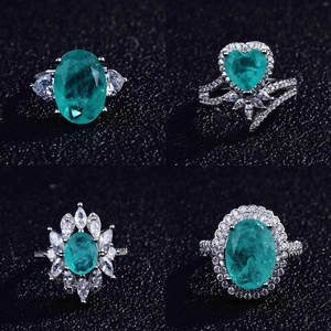 Luxurious pear-cut emerald silver ring collection with sparkling micro-pave diamonds