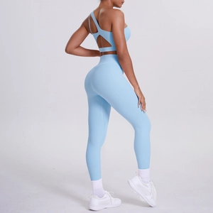Detail of sky blue yoga set showing the racerback cutout bra and high waisted leggings