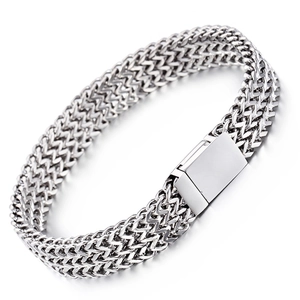 Men's silver titanium steel dragon bone chain bracelet with polished metal clasp on white background