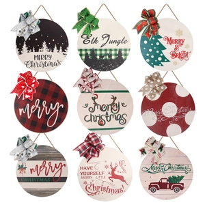 Set of nine 28cm Christmas round wooden signs with festive patterns and decorative bows