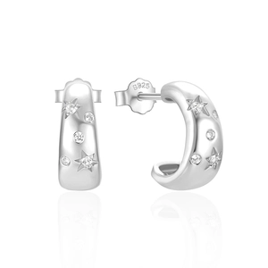 Detailed macro view of S925 sterling silver C-shaped studs with star patterns and zircons