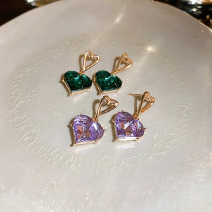 Elegant gold heart earrings with emerald green and light purple zircon gemstones