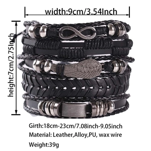 Detail view of multilayer leather bracelet set with wing and infinity metal charms