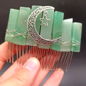 Handmade green crystal hair comb featuring silver crescent moon and star celestial charms