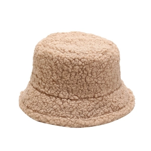 Minimalist light brown teddy fleece bucket hat with warm plush texture for women