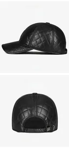 Detail view of the quilted pattern and adjustable metal buckle on a black winter PU hat
