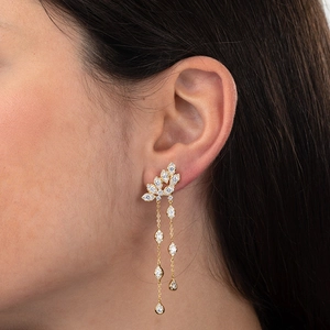 Elegant gold tassel earrings with leaf-shaped studs and sparkling zircons for women