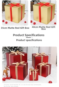 Close-up of matte gift boxes in red and gold with silk ribbons and size labels