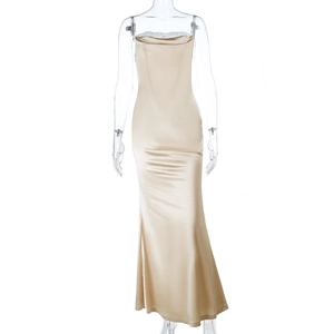 Close-up detail of champagne satin dress featuring elegant white lace neckline stitching