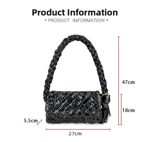 Detail view of woven black oil-wax leather shoulder bag with size dimensions 27x18x5.5cm