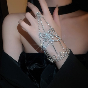 Close-up of a sparkling butterfly ring bracelet integrated design with silver rhinestones